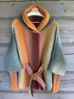 Adīta jaka oranžos toņos