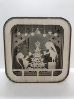 Dekoratīva ainiņa "Egles rotāšana"