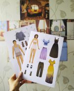 Papīra leļļu ģimene ar māju