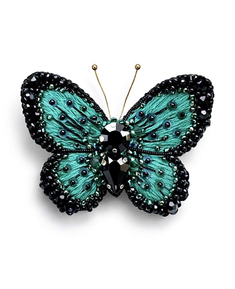 piespraude tirkīza taurenis