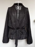 Adīta jaka melnā krāsā