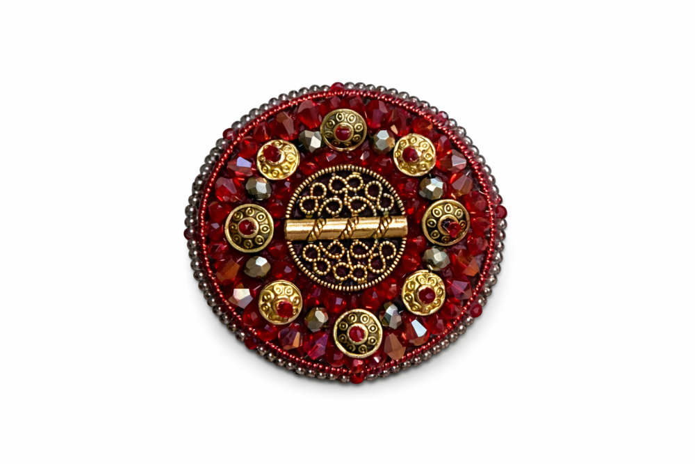 sakta stilizēta broša