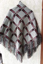 rūtaina villaine plecu lakats