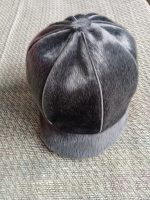 Cepure ar nagu un atstarojušām kantītēm