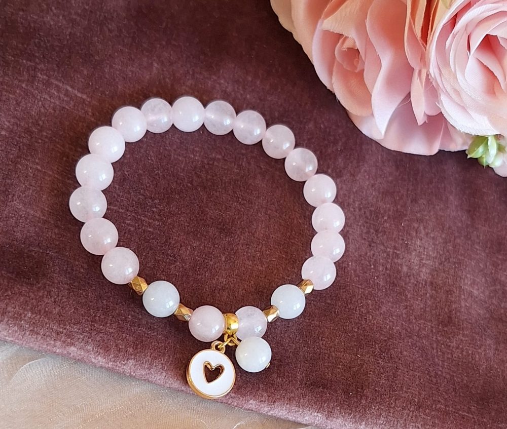 rokassprādze ar rozā kvarca bumbiņām