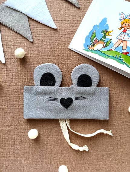 Bērnu peles galvas maska no dabīga auduma, piemērota svētkiem un rotaļām.