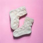 Baltas mežģīņu zeķes