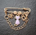 Piespraude ar ķēdītēm un KAĶI